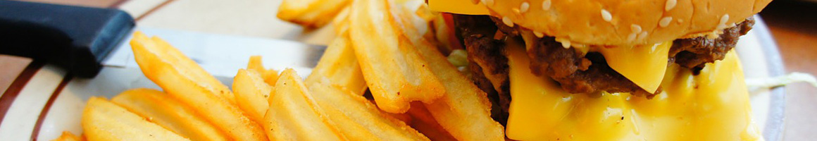 Eating Burger at Burger House restaurant in League City, TX.
